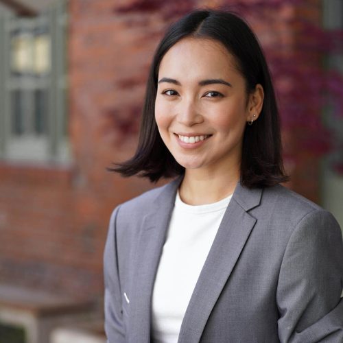 smiling-young-asian-woman-professional-manager-wea-2025-02-11-16-20-21-utc-e1751518473164.jpg
