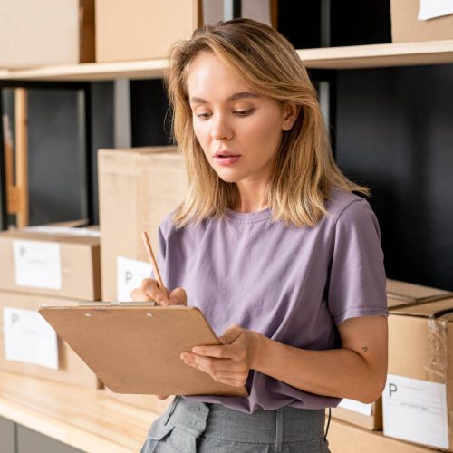 young-serious-blond-female-with-pen-and-clipboard-2025-03-13-10-18-40-utc-e1751518624482.jpeg